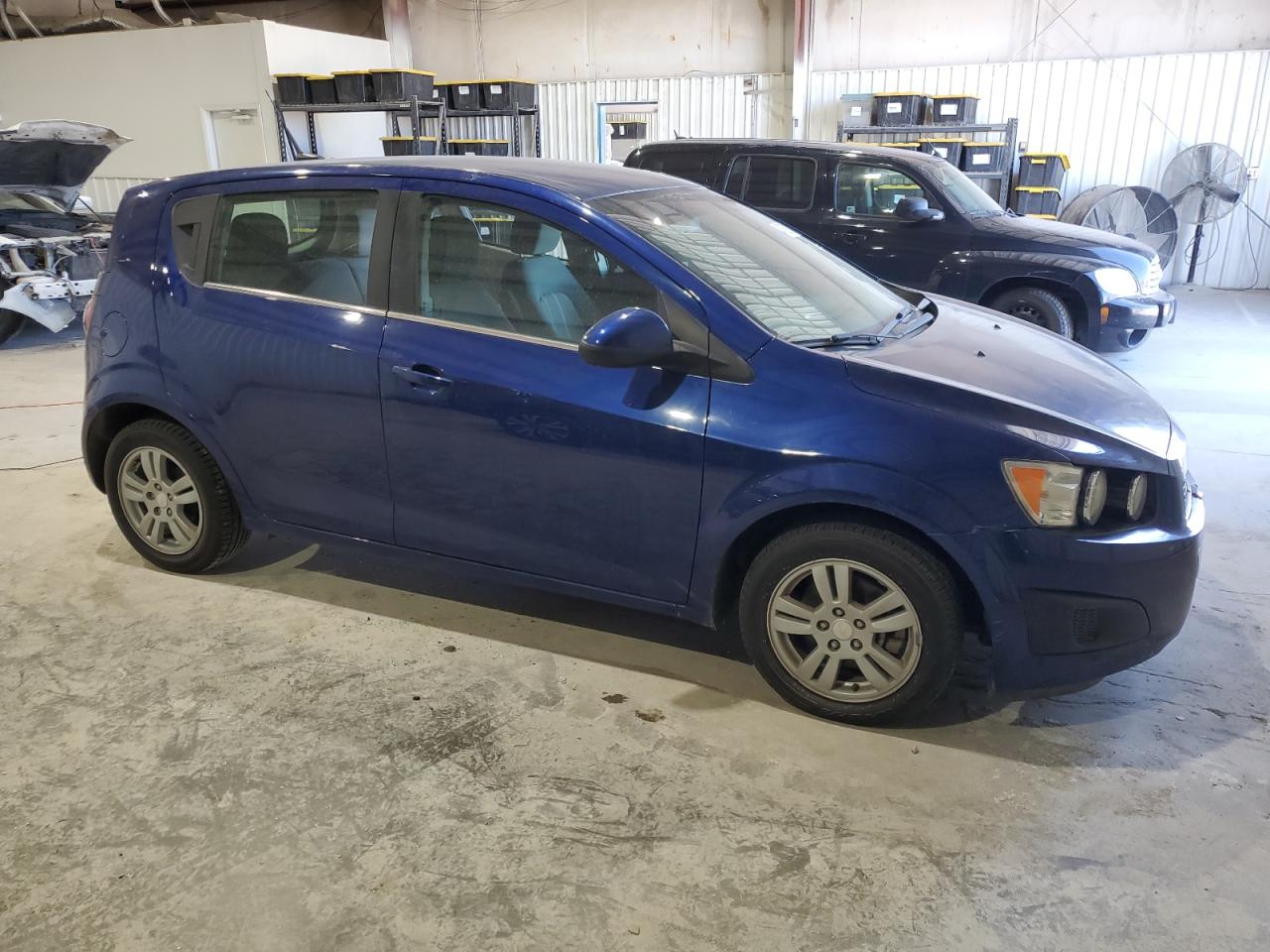 2014 Chevrolet Sonic VIN 1G1JC6SH9E4231585 Copart auction photo, side / rear end damage thumbnail 4