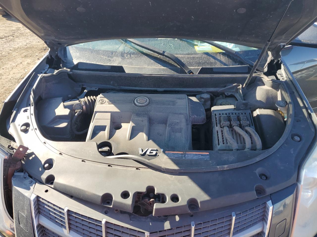 2012 Cadillac SRX VIN 3GYFNFE35CS586817 Copart auction photo, front end / side damage thumbnail 12