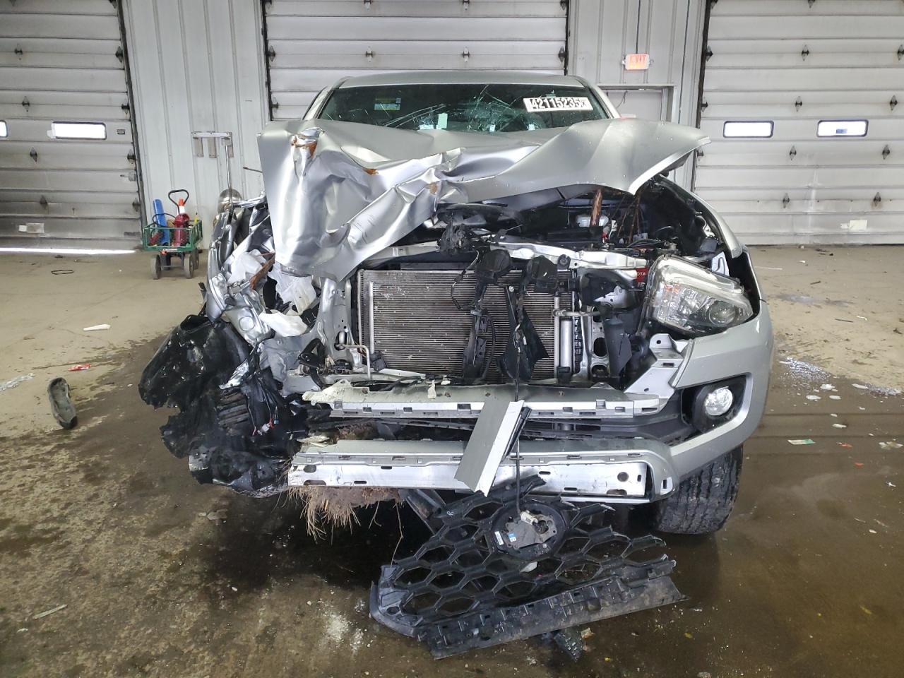 2021 Toyota Tacoma VIN 5TFCZ5AN0MX269557 Copart auction photo, front end / side damage thumbnail 5