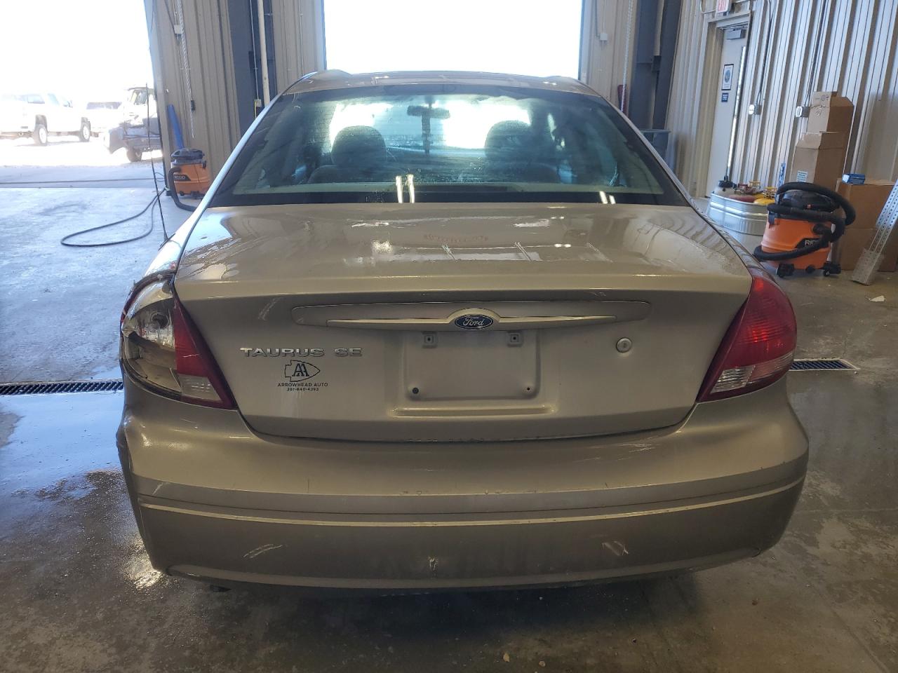 2005 Ford Taurus VIN 1FAFP53U35A129018 Copart auction photo, burn - engine / rear end damage thumbnail 6