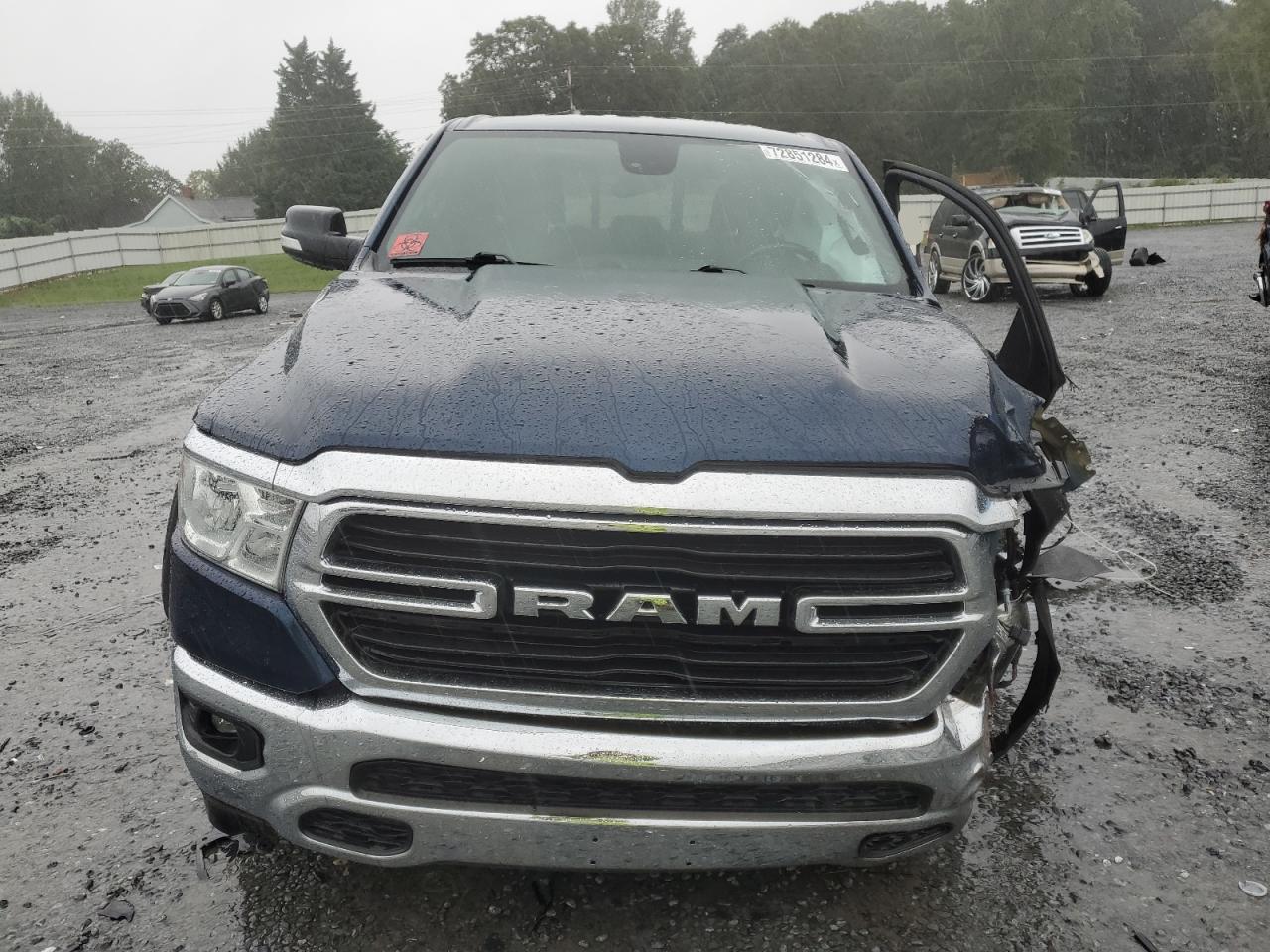 2021 RAM 1500 VIN 1C6SRFBT1MN571490 Copart auction photo, front end / side damage thumbnail 5