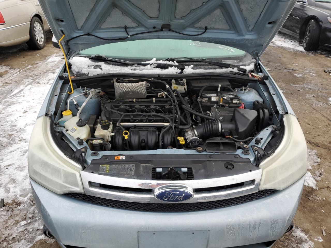 2009 Ford Focus VIN 1FAHP37N69W258878 Copart auction photo, rear end damage thumbnail 12