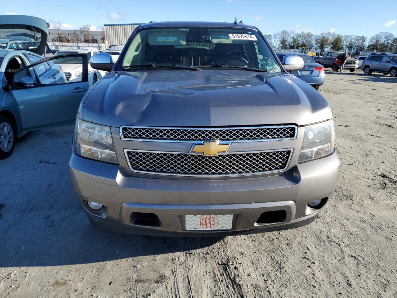 2012 Chevrolet Suburban VIN 1GNSCKE04CR218311 Copart auction photo, top/roof damage thumbnail 5