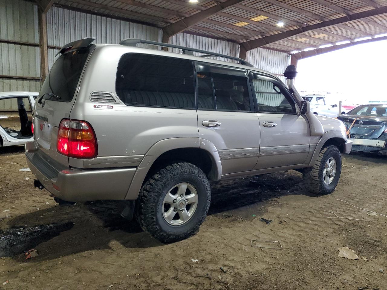 1999 Toyota Land Cruiser VIN JT3HT05J2X0049288 Copart auction photo, minor dent/scratches damage thumbnail 3