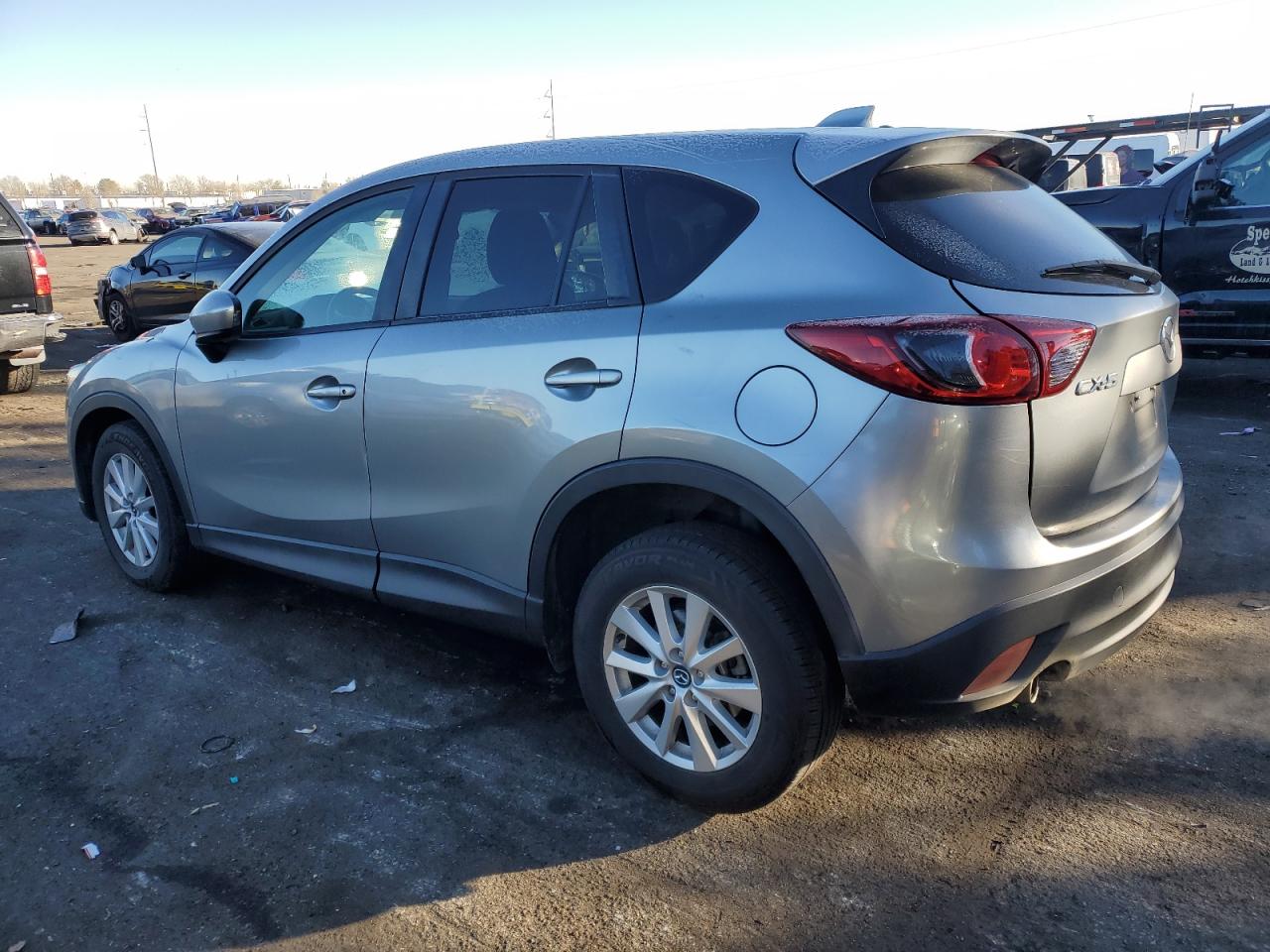 2014 Mazda CX-5 VIN JM3KE2CY4E0358577 Copart auction photo, front end / side damage thumbnail 2