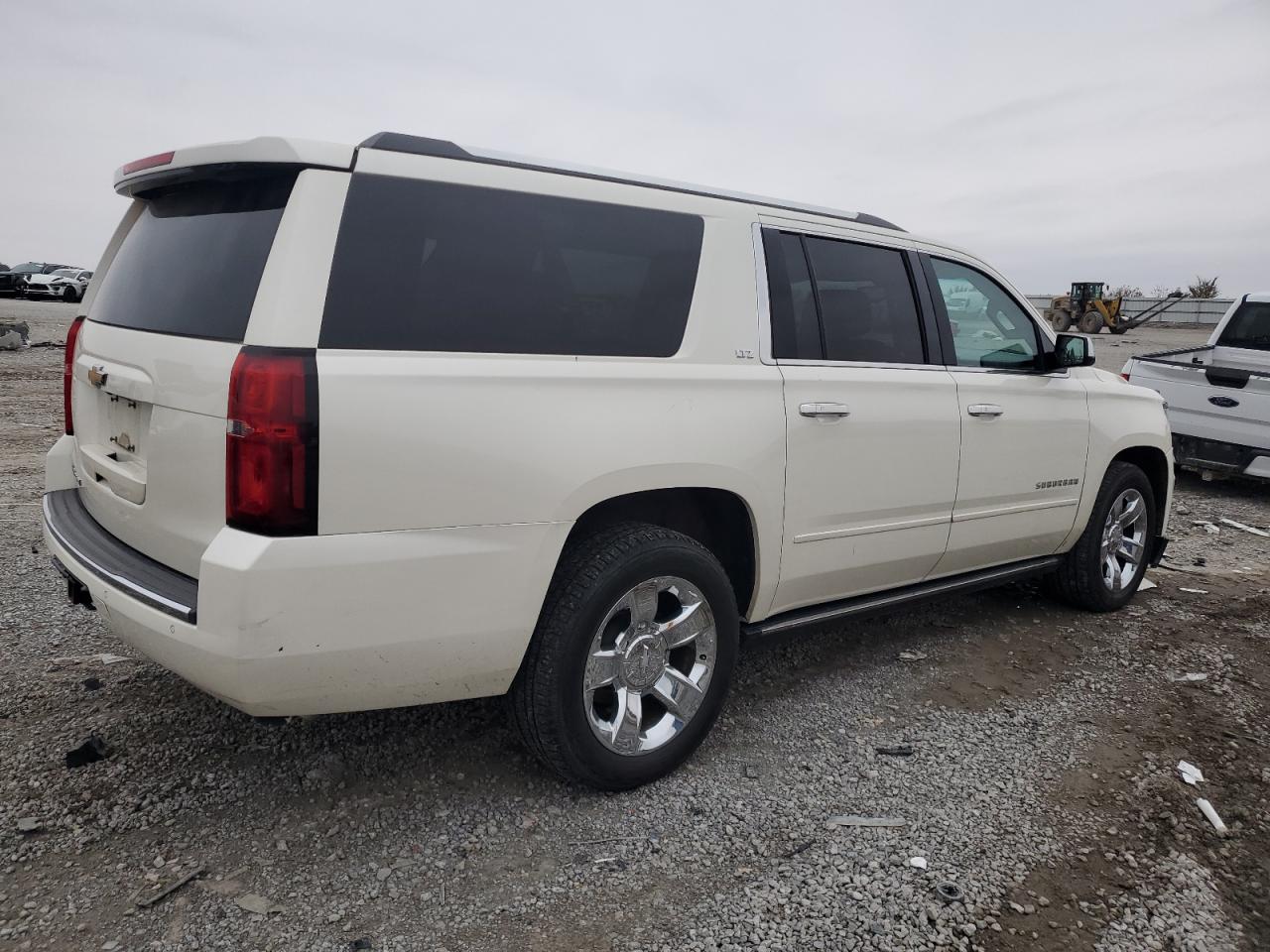 2015 Chevrolet Suburban VIN 1GNSKKKC1FR706881 Copart auction photo, front end damage thumbnail 3