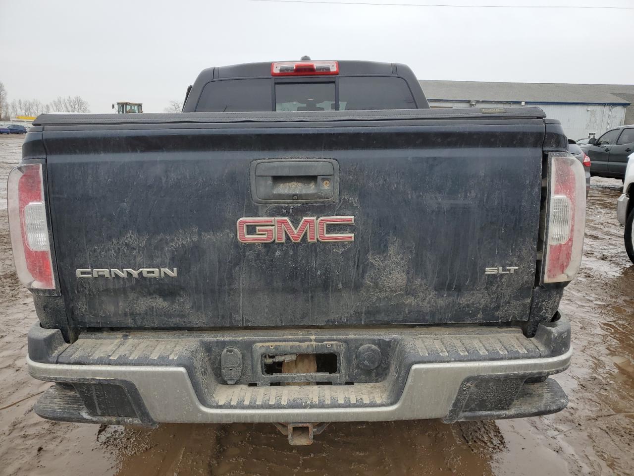 2015 GMC Canyon VIN 1GTG6CE36F1130143 Copart auction photo, side / rear end damage thumbnail 6