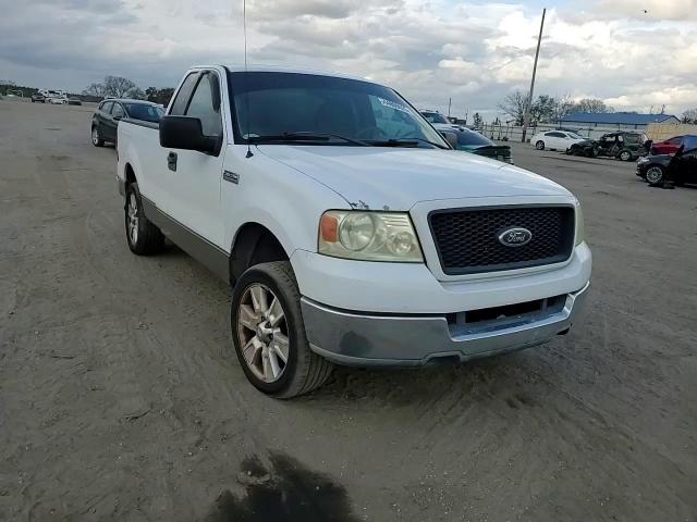 2004 Ford F-150 VIN 1FTRF12W14NA71259 Copart auction photo, side damage thumbnail 11