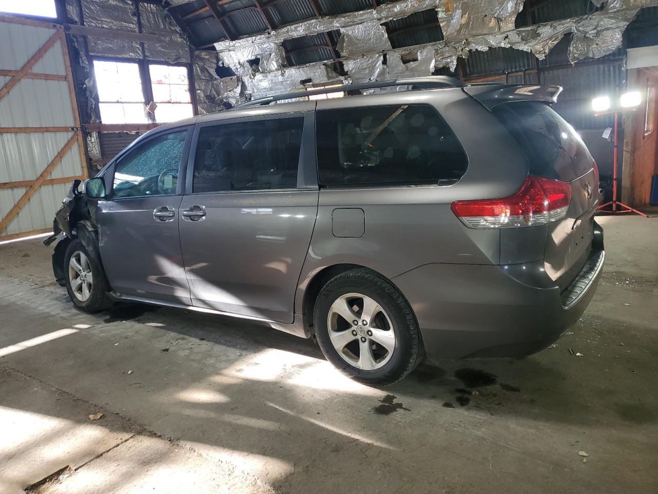 2012 Toyota Sienna VIN 5TDKK3DC7CS211464 Copart auction photo, front end / side damage thumbnail 2