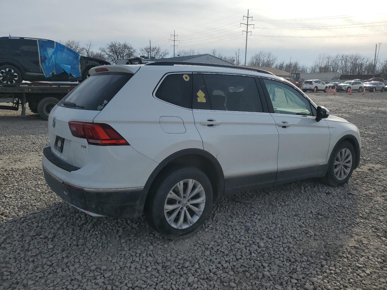 2018 Volkswagen Tiguan VIN 3VV3B7AX9JM004852 Copart auction photo, side / front end damage thumbnail 3