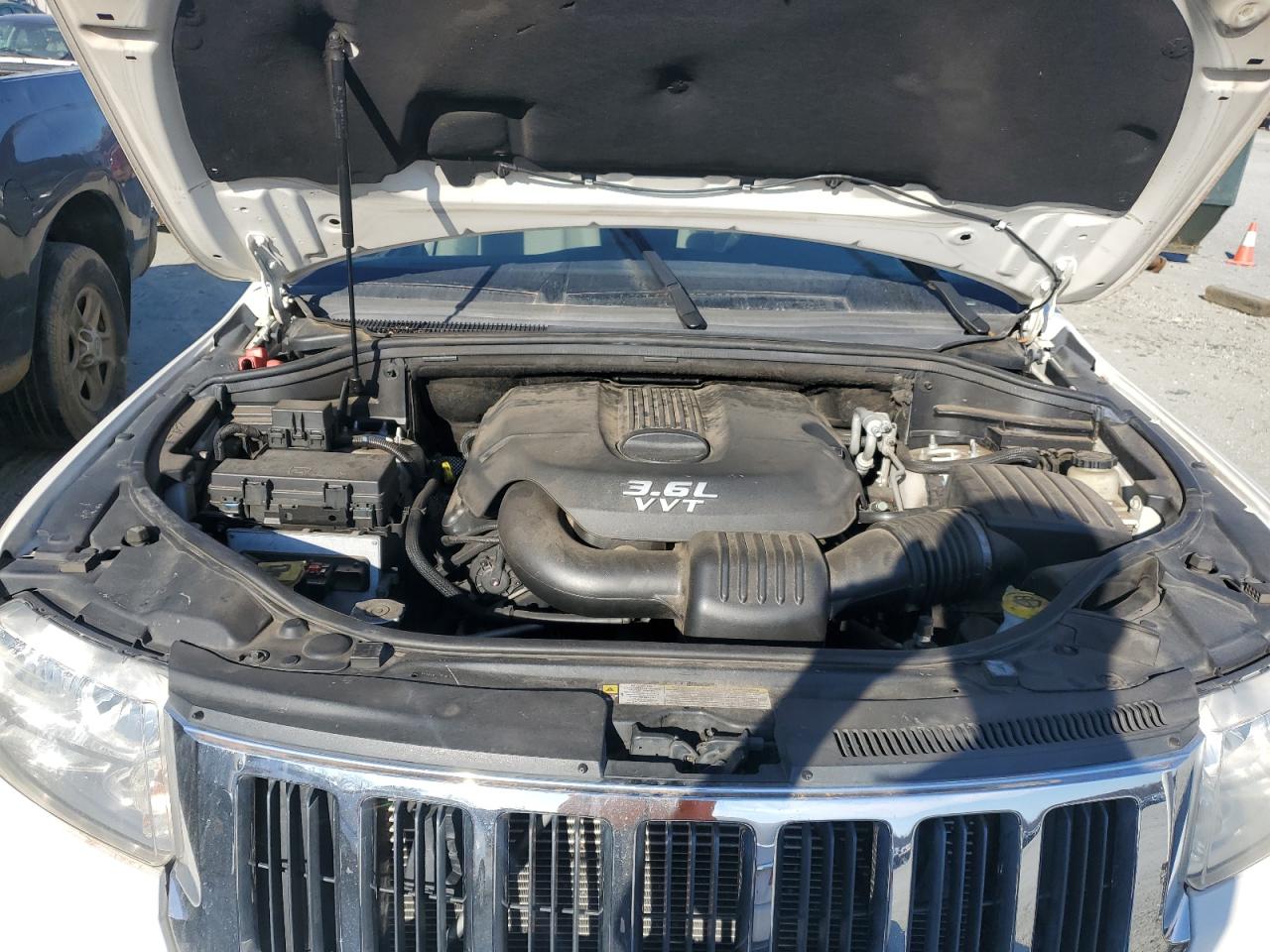 2012 Jeep Grand Cherokee VIN 1C4RJFAG0CC201435 Copart auction photo, rear end damage thumbnail 12