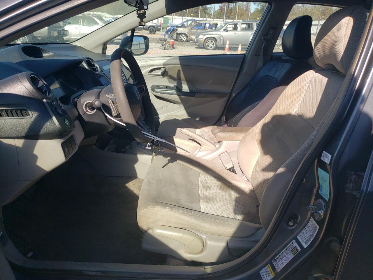 2011 Honda Insight VIN JHMZE2H77BS004641 Copart auction photo, water/flood damage thumbnail 7