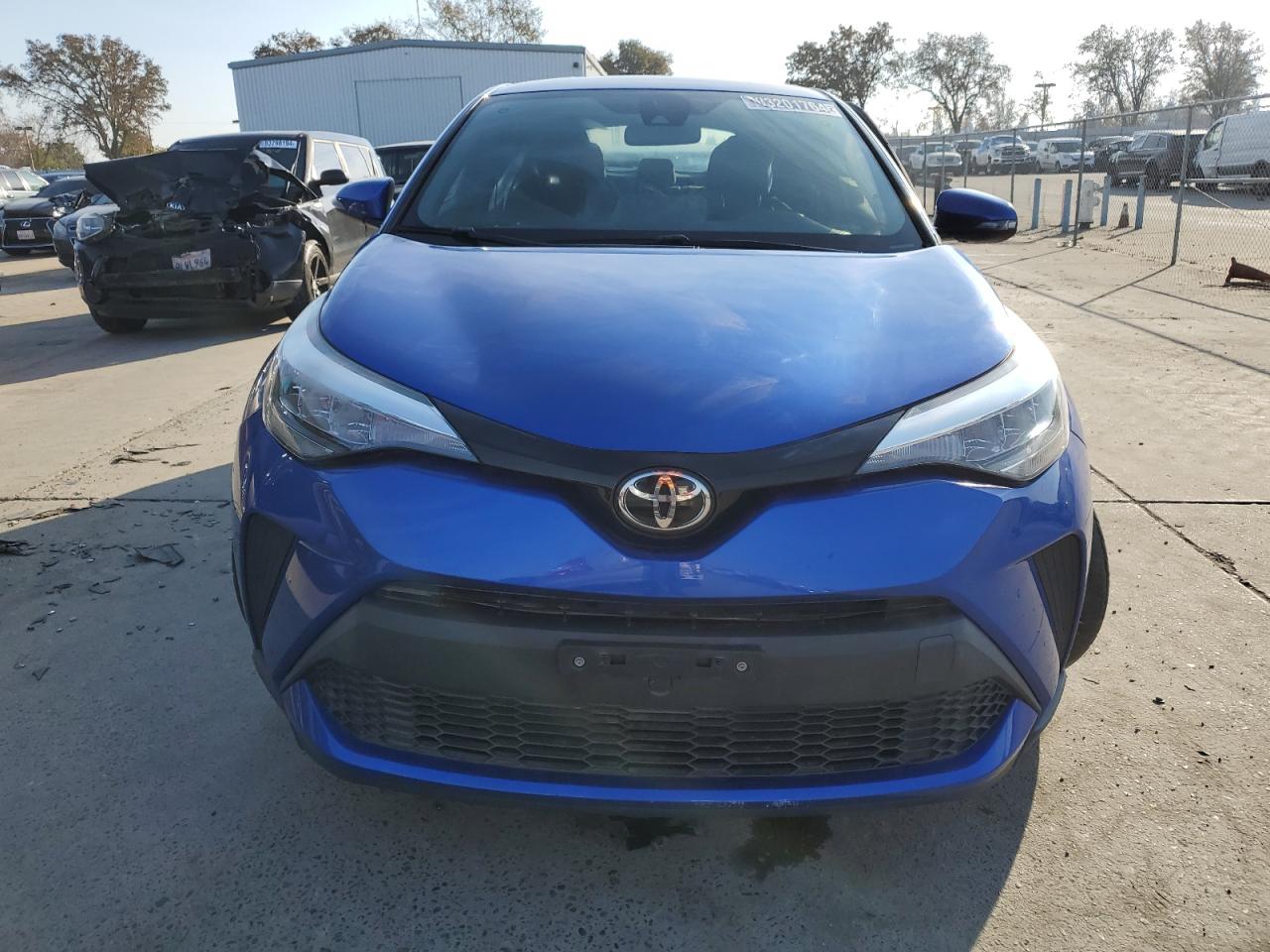 2020 Toyota C-HR VIN JTNKHMBX1L1067722 Copart auction photo, side damage thumbnail 5
