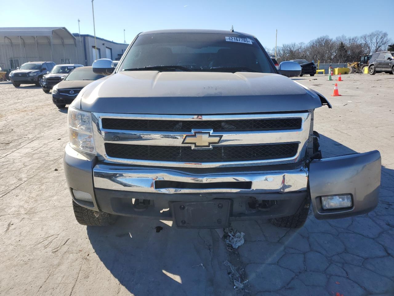 2009 Chevrolet Silverado VIN 1GCEK29089Z259617 Copart auction photo, front end / side damage thumbnail 5