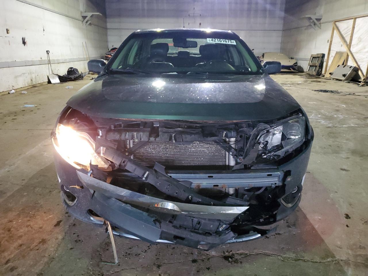 2012 Ford Fusion VIN 3FAHP0JG0CR115511 Copart auction photo, front end damage thumbnail 5