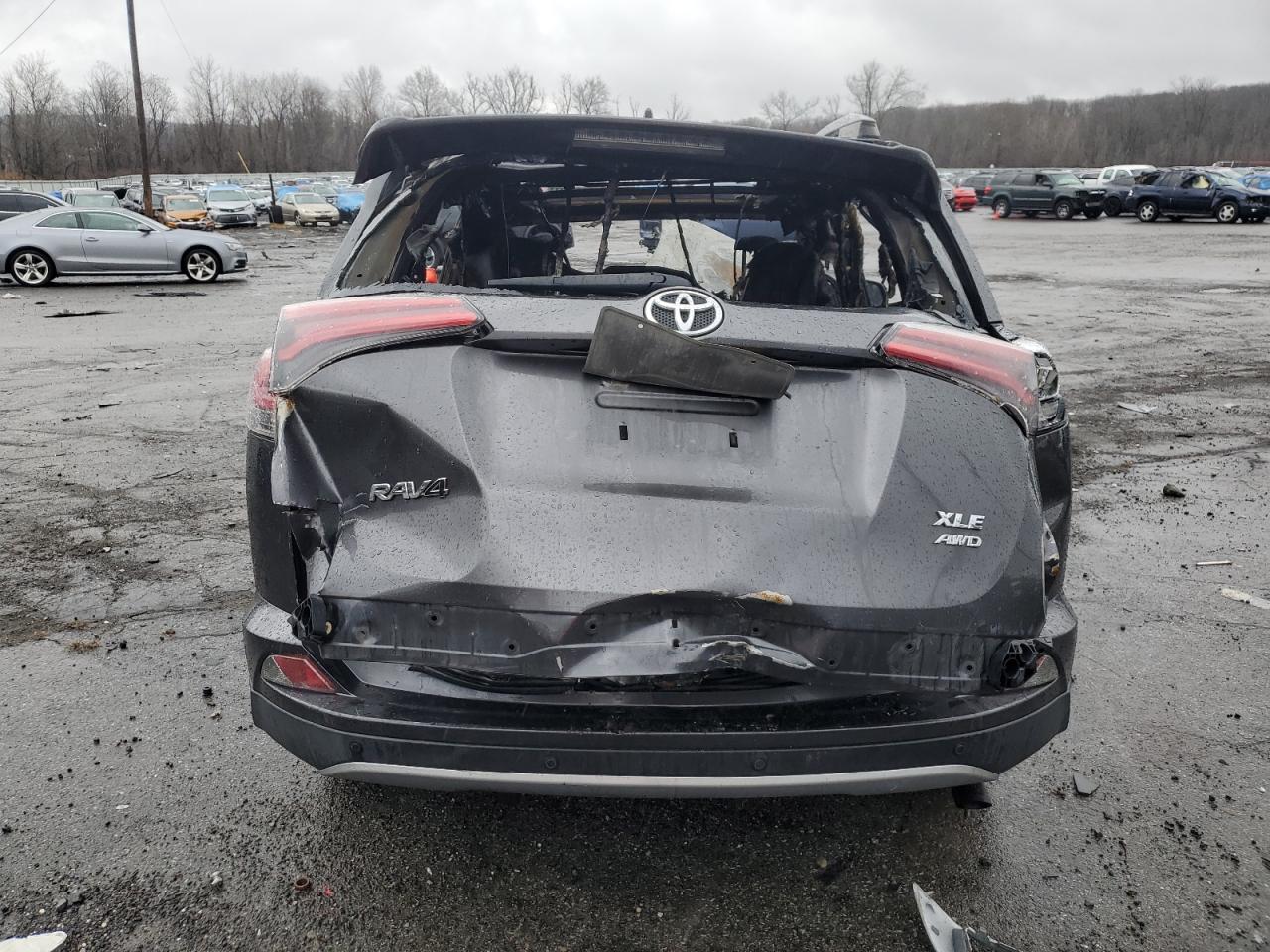 2018 Toyota RAV 4 VIN JTMRFREV9JJ718625 Copart auction photo, burn damage thumbnail 6