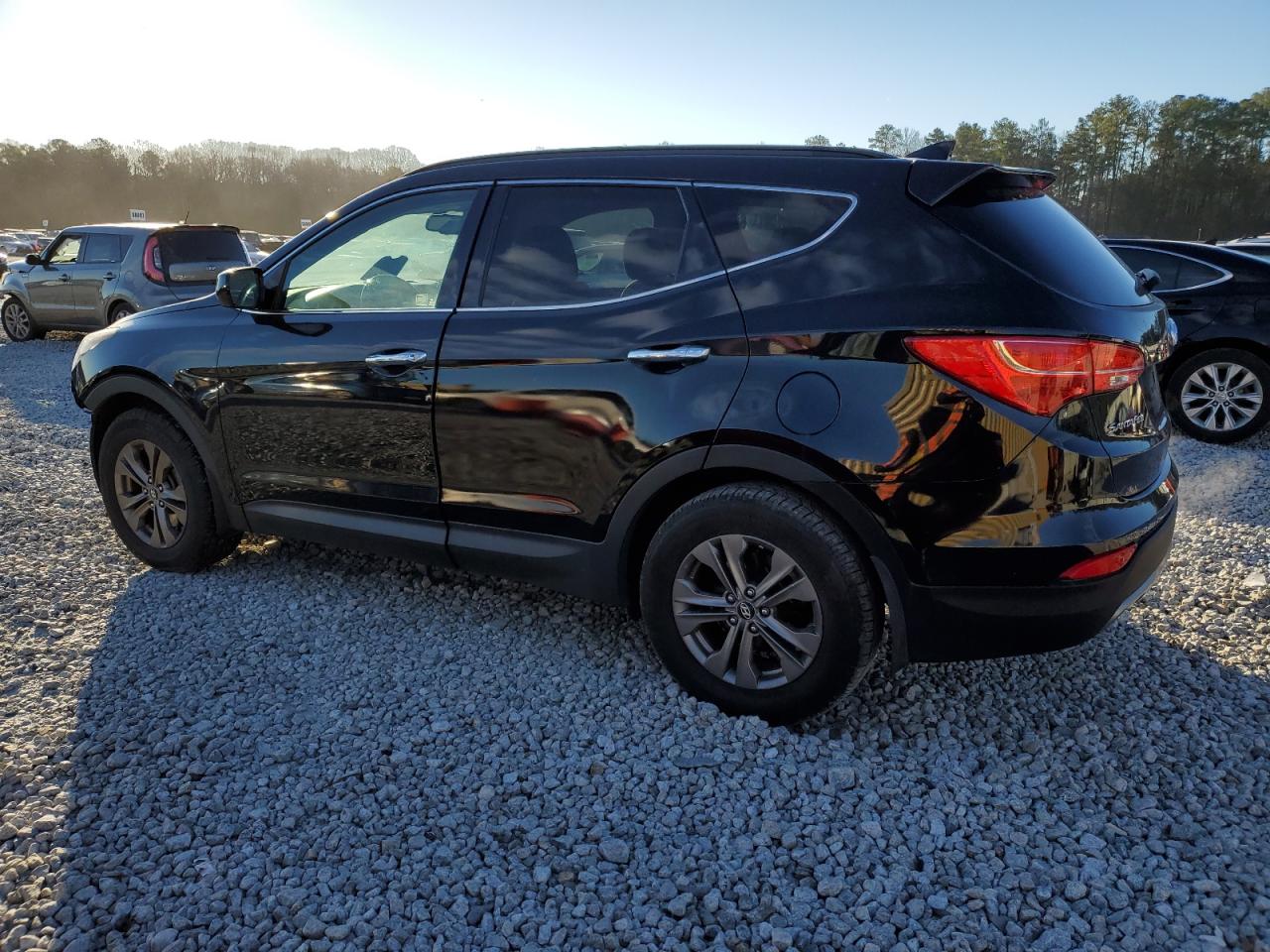 2014 Hyundai Santa Fe VIN 5XYZU3LB9EG186262 Copart auction photo, front end / undercarriage damage thumbnail 2