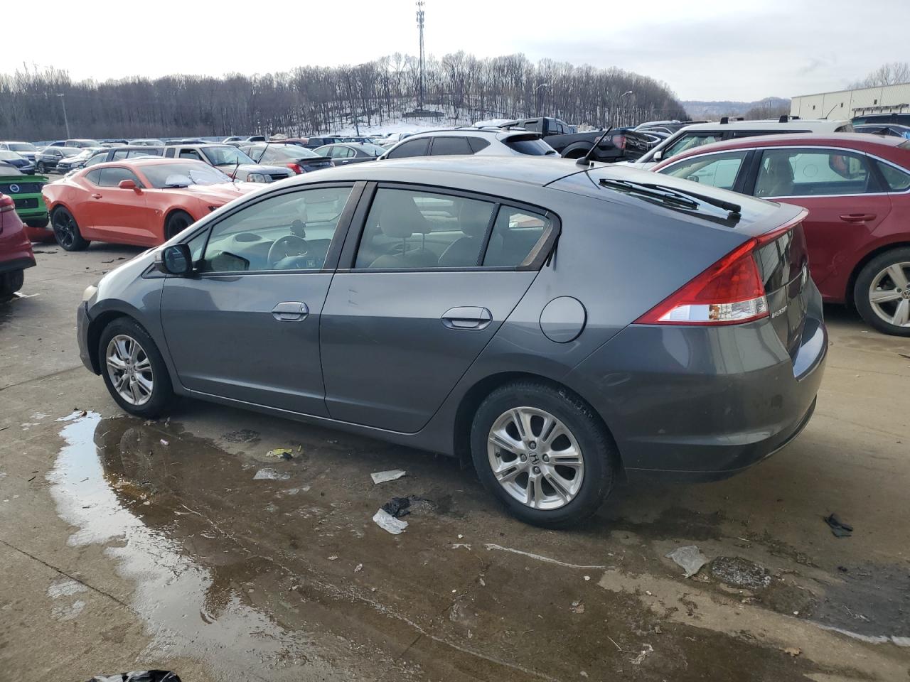 2010 Honda Insight VIN JHMZE2H7XAS010013 Copart auction photo, all over damage thumbnail 2