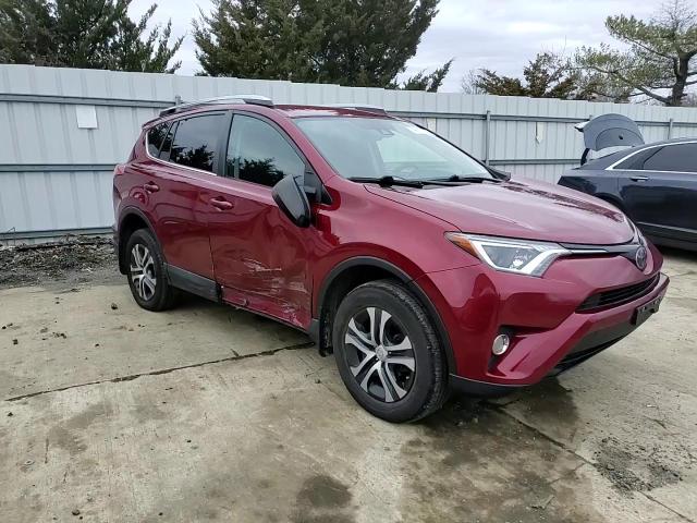 2018 Toyota RAV 4 VIN 2T3BFREVXJW785320 Copart auction photo, side damage thumbnail 12