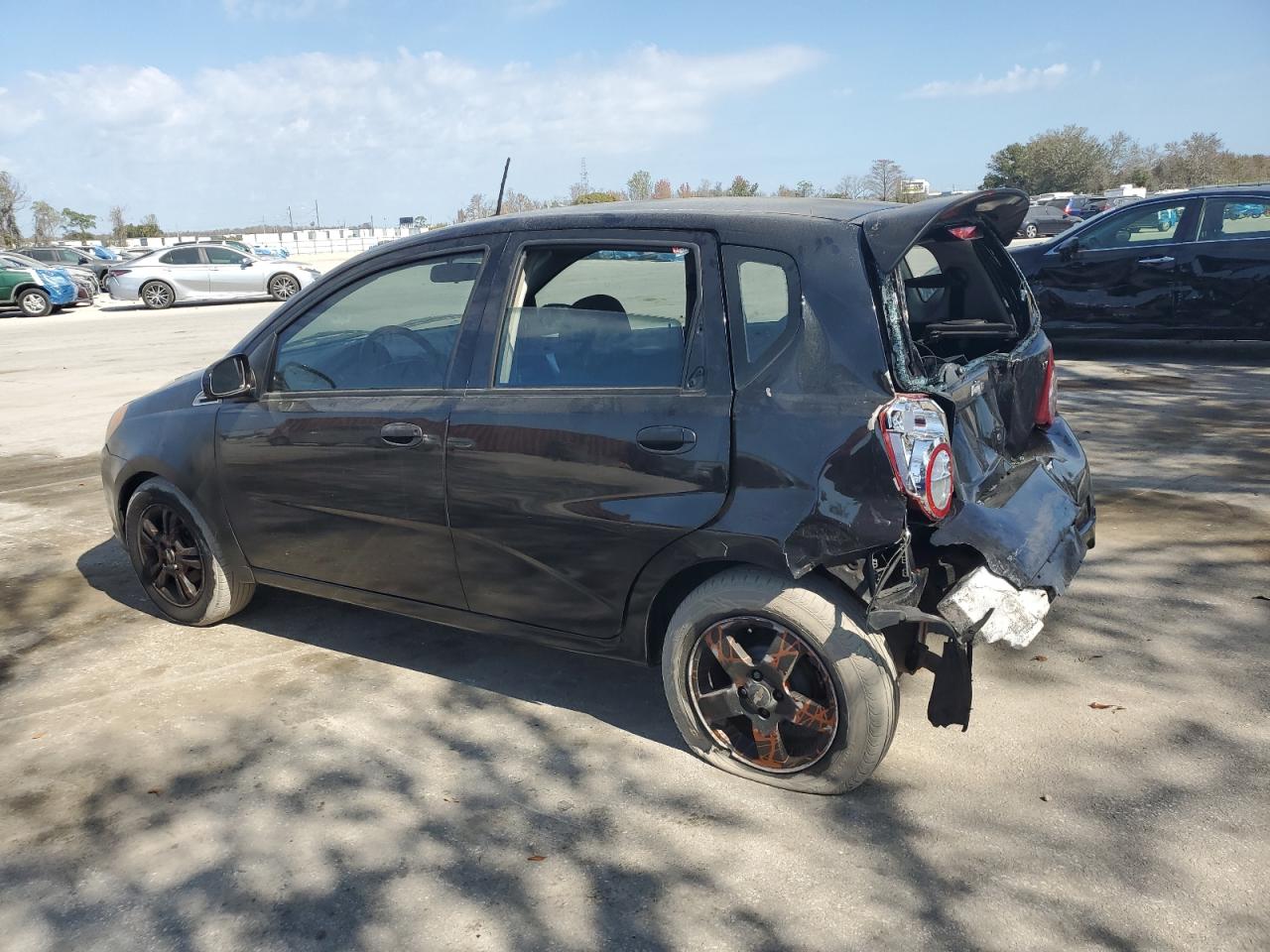 2009 Chevrolet Aveo VIN KL1TD66E09B321049 Copart auction photo, rear end damage thumbnail 2