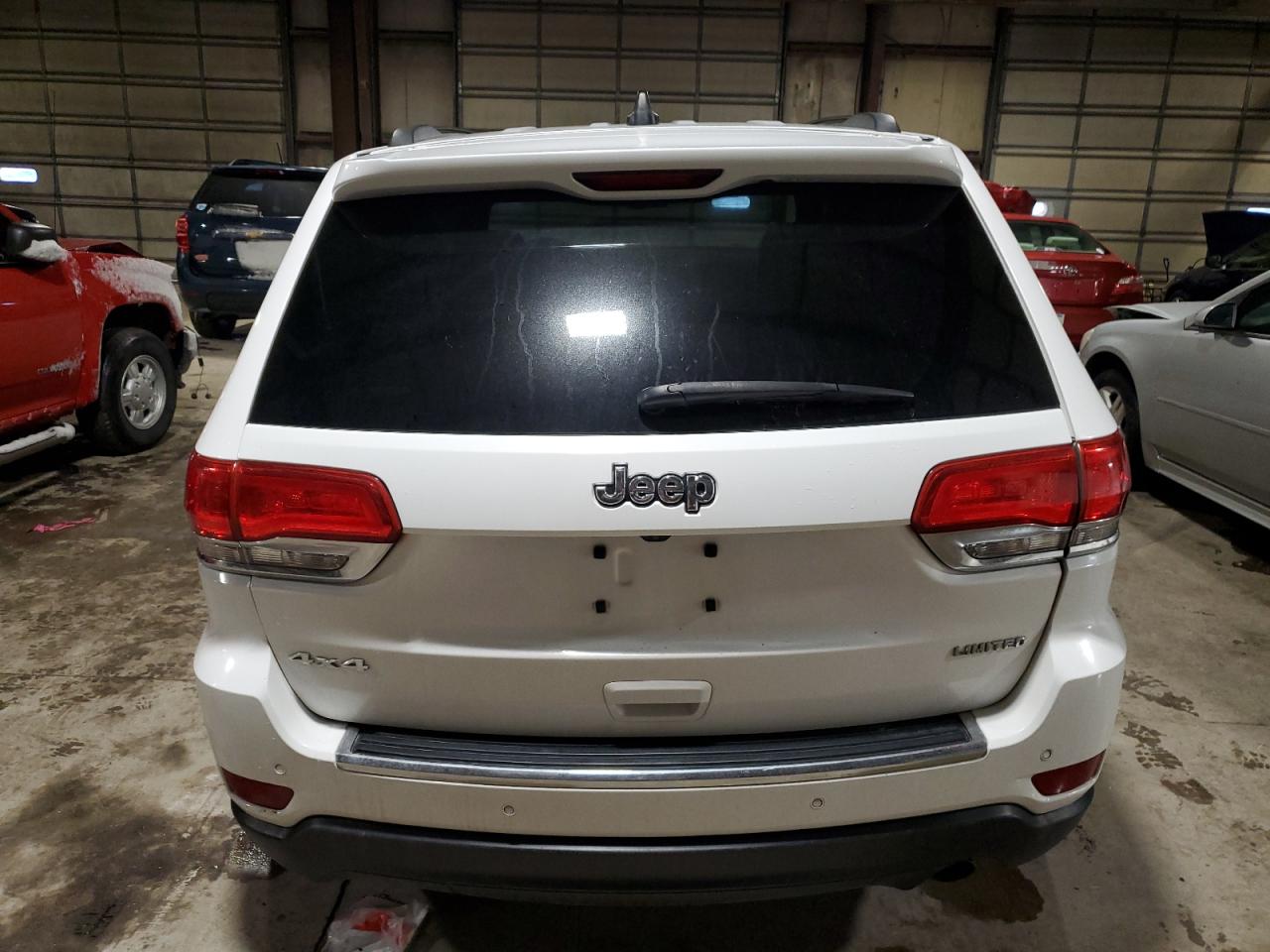 2015 Jeep Grand Cherokee VIN 1C4RJFBG5FC609125 Copart auction photo, rear end / undercarriage damage thumbnail 6