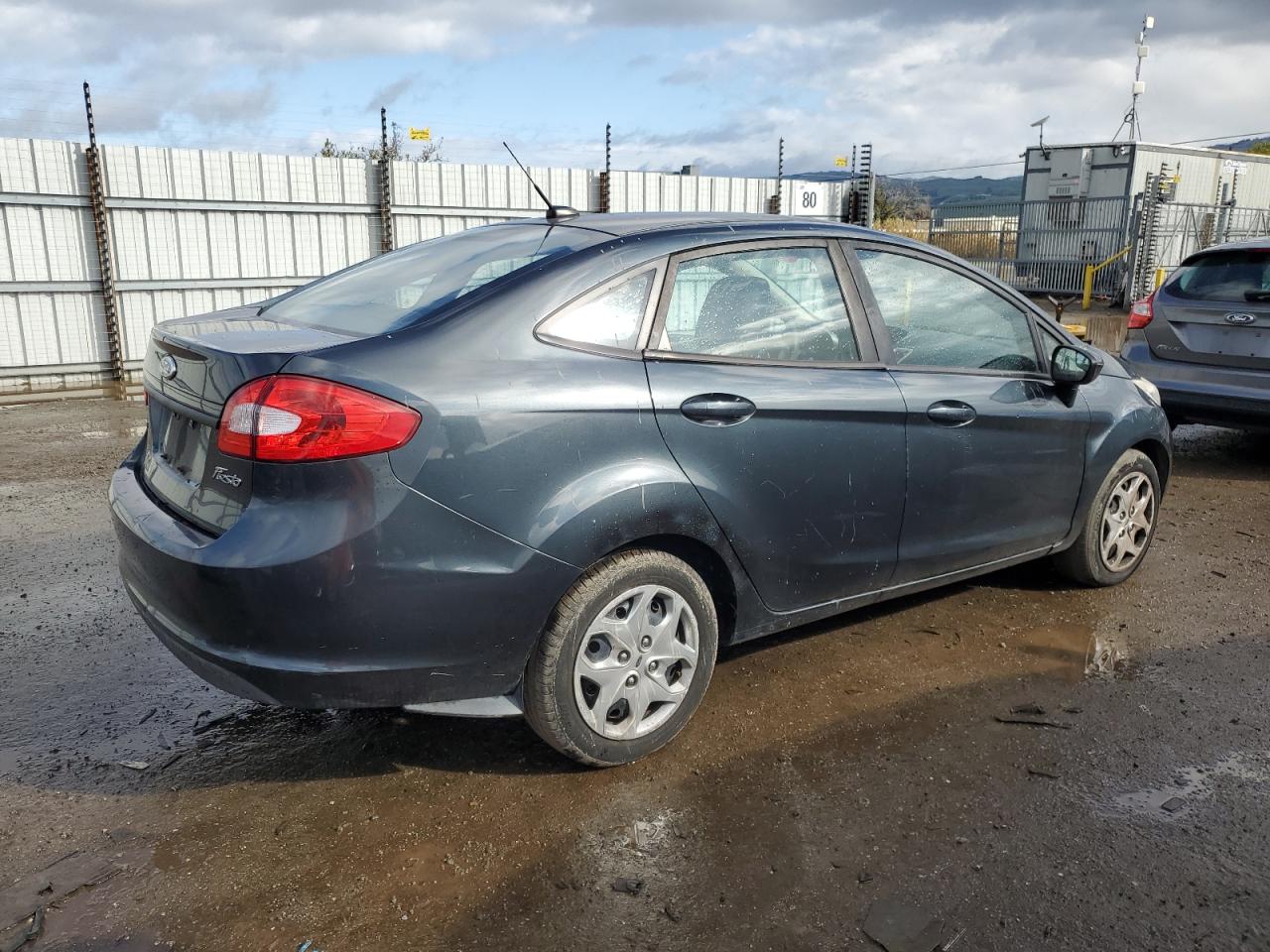 2011 Ford Fiesta VIN 3FADP4BJ1BM200739 Copart auction photo, front end / side damage thumbnail 3
