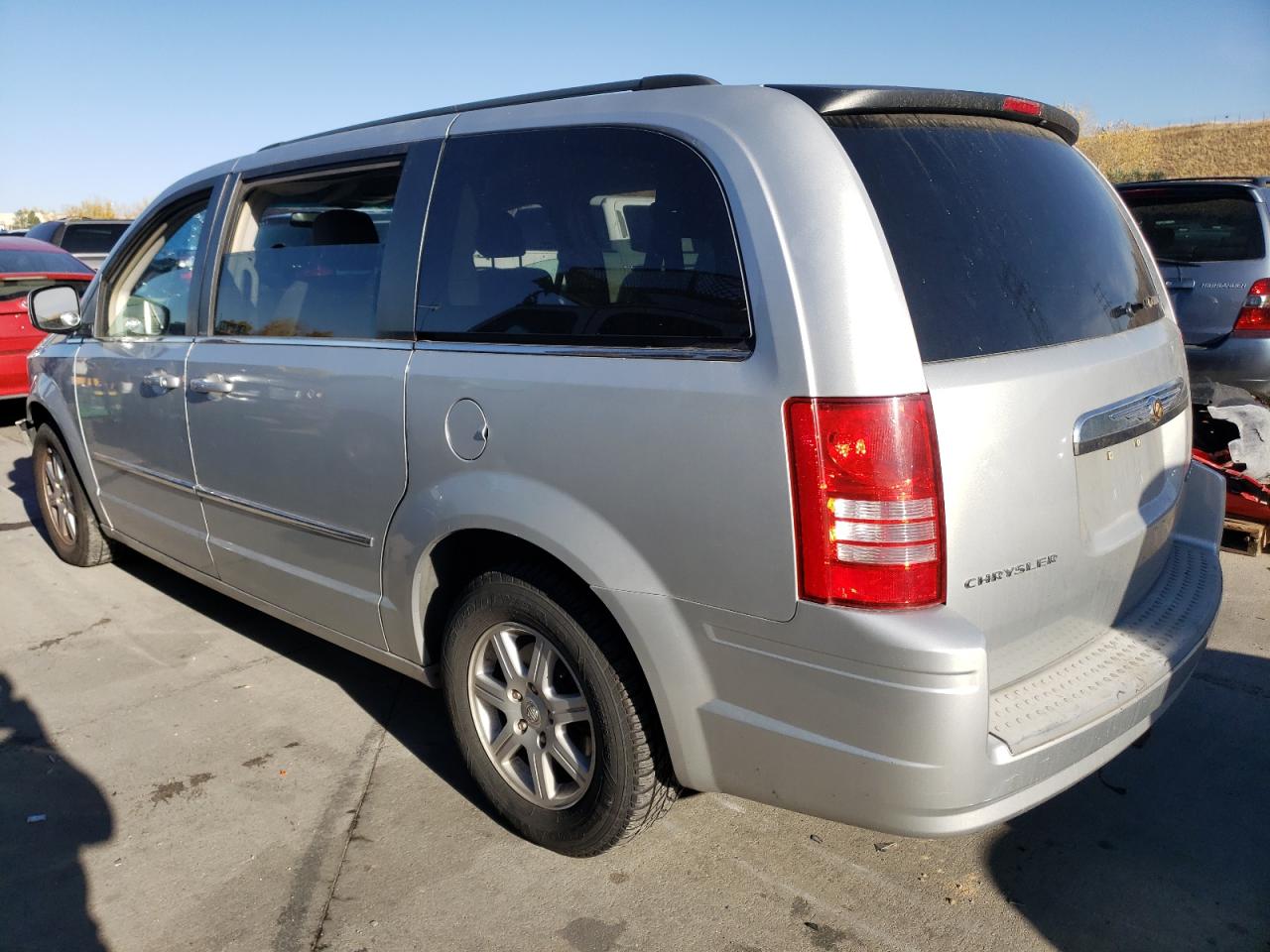 2010 Chrysler Town & Country VIN 2A4RR5D16AR103020 Copart auction photo, front end / hail damage thumbnail 2