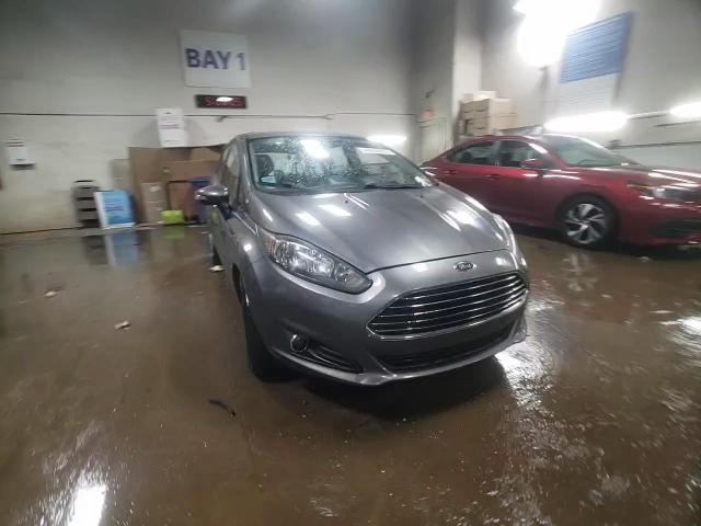 2014 Ford Fiesta VIN 3FADP4EJ6EM103763 Copart auction photo, side / minor dent/scratches damage thumbnail 14