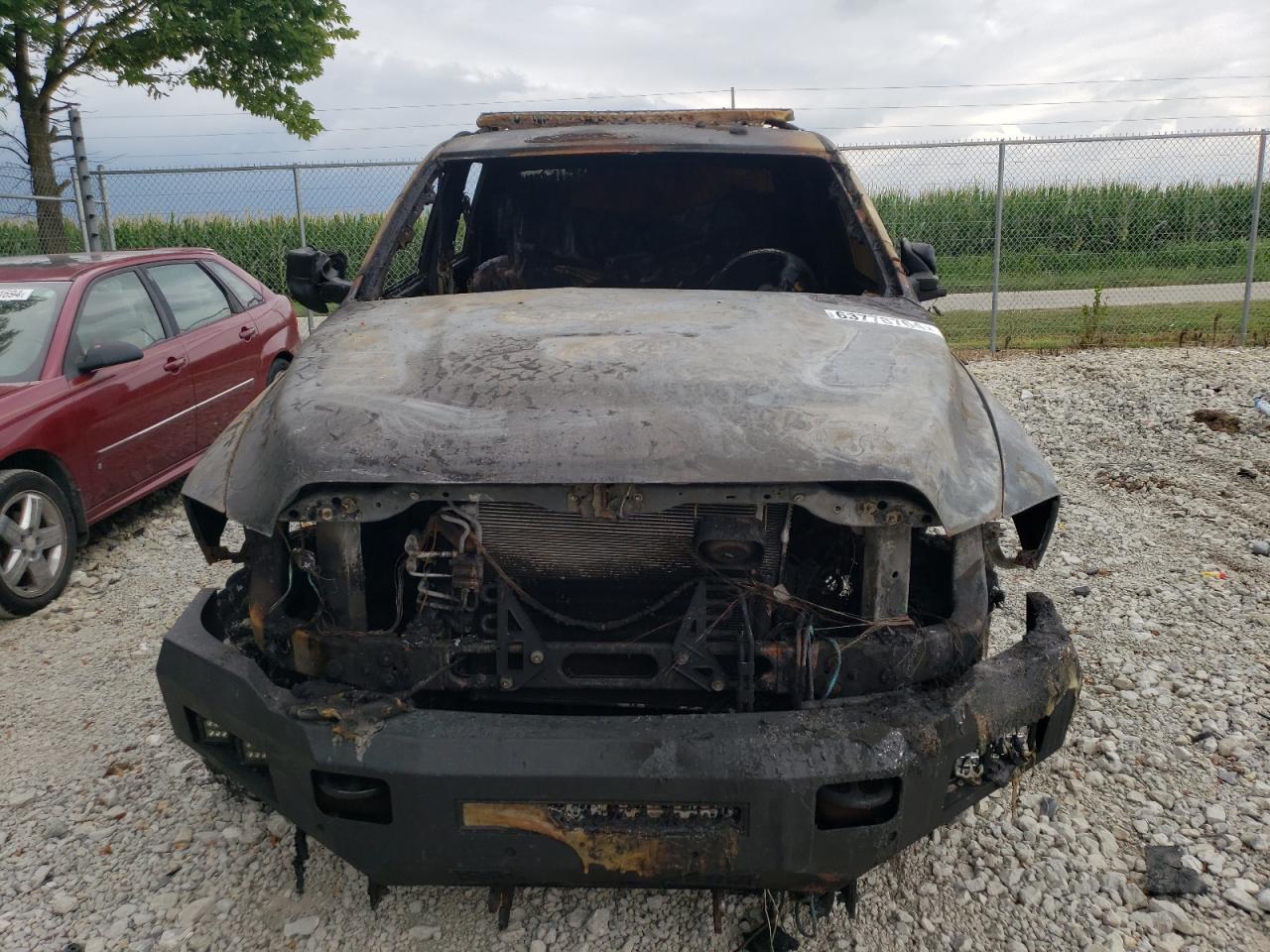 2013 RAM 2500 VIN 3C6TR5CT9DG568973 Copart auction photo, burn damage thumbnail 5