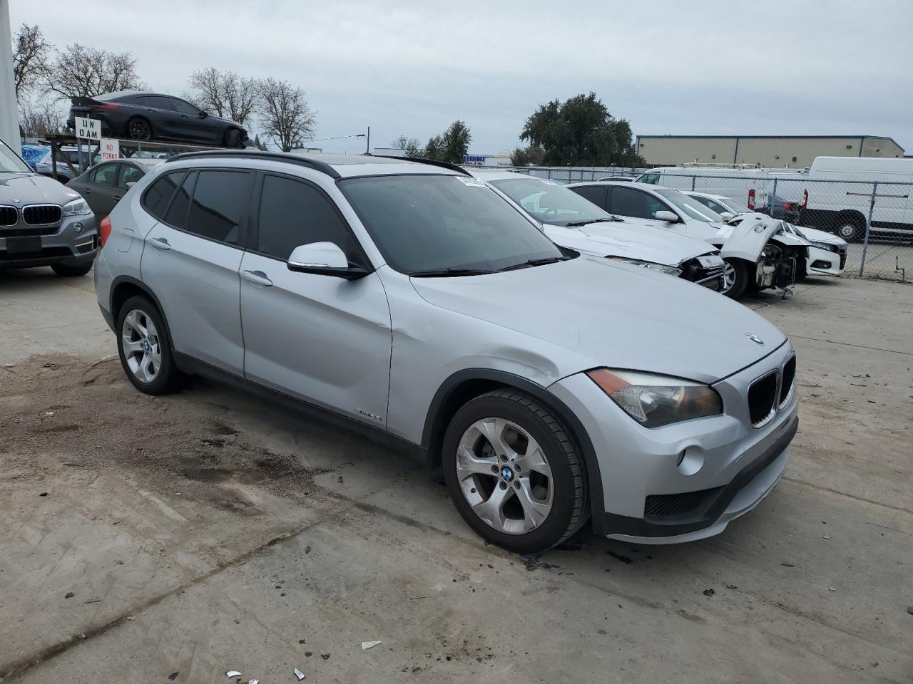 2015 BMW X1 VIN WBAVM1C50FV315381 Copart auction photo, front end damage thumbnail 4