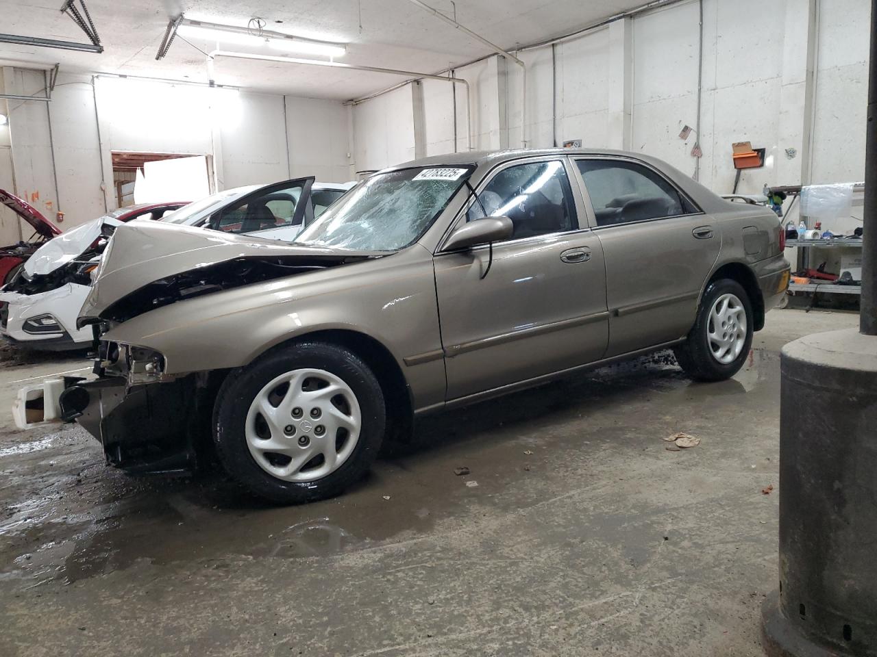 2000 Mazda 626 VIN 1YVGF22C6Y5175233 - Copart auction photo