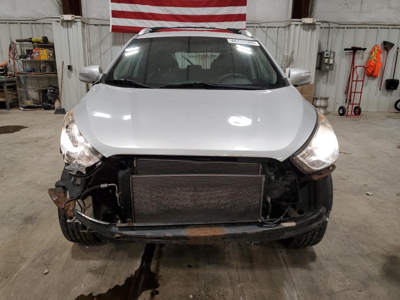 2012 Hyundai Tucson VIN KM8JUCAC6CU477561 Copart auction photo, front end / rear end damage thumbnail 5