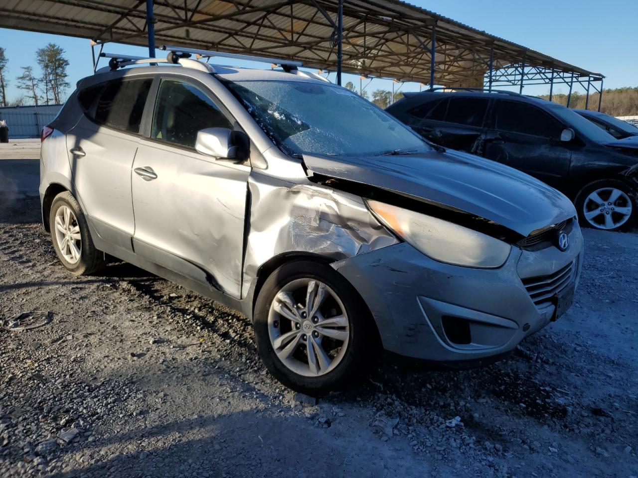 2011 Hyundai Tucson VIN KM8JU3AC4BU219683 Copart auction photo, front end / side damage thumbnail 4