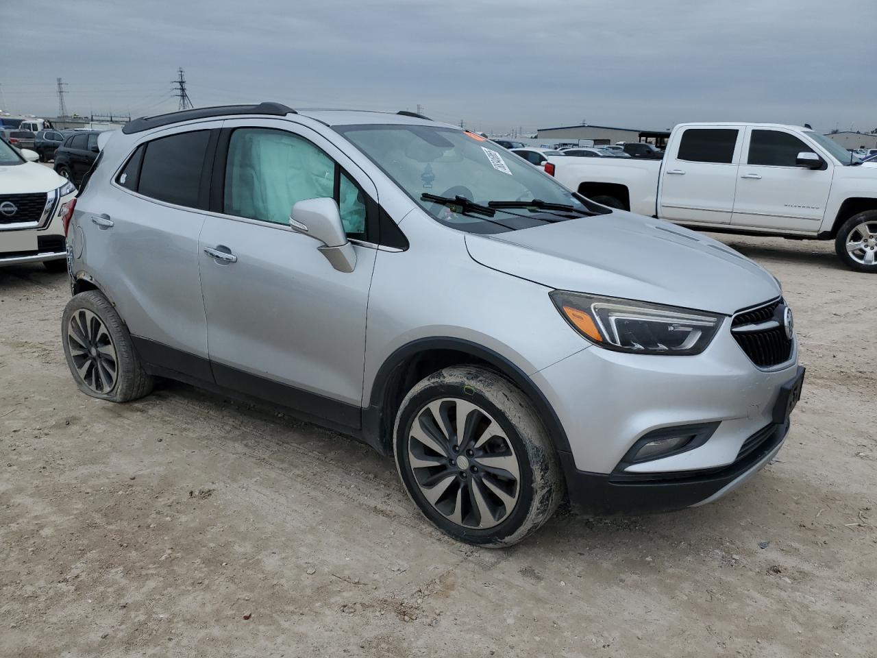2018 Buick Encore VIN KL4CJGSB5JB548299 Copart auction photo, side / rear end damage thumbnail 4