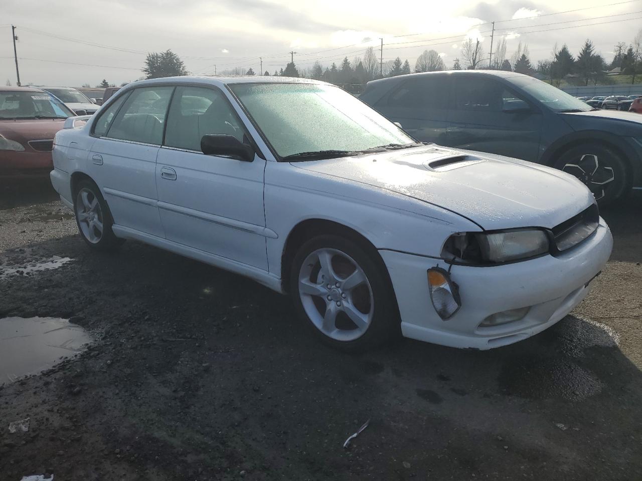 1999 Subaru Legacy VIN 4S3BD6753X7251159 Copart auction photo, front end damage thumbnail 4