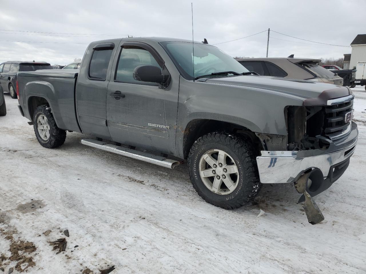 2011 GMC Sierra VIN 1GTR1VE06BZ101021 Copart auction photo, front end / side damage thumbnail 4