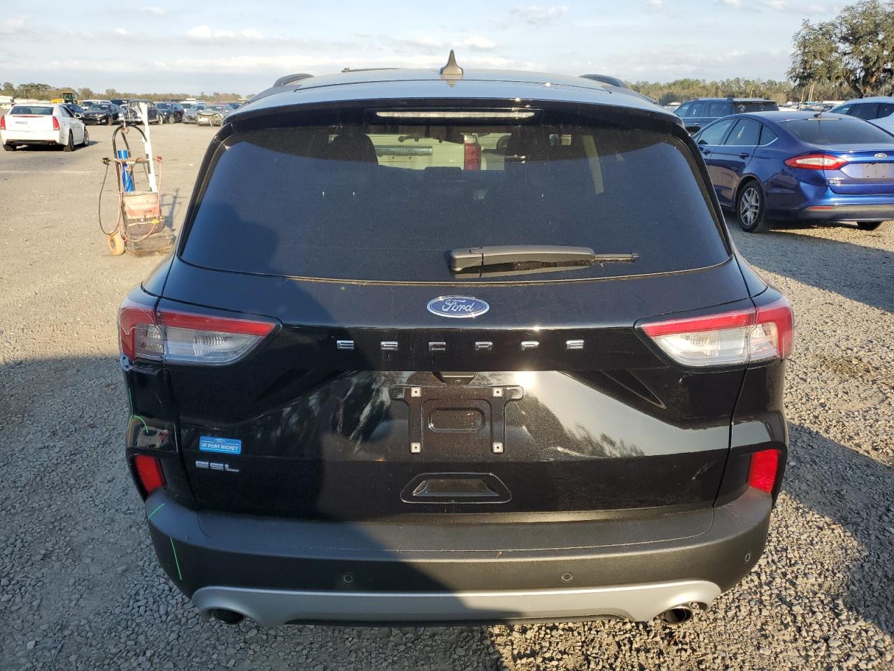 2021 Ford Escape VIN 1FMCU0H67MUA92762 Copart auction photo, front end / rear end damage thumbnail 6