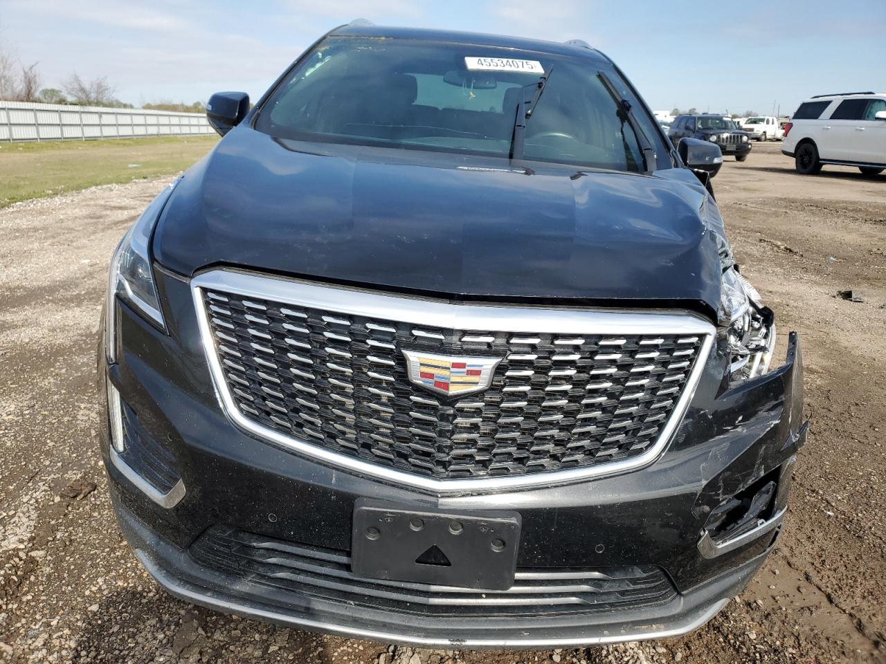 2021 Cadillac XT5 VIN 1GYKNCRS1MZ107036 Copart auction photo, front end / side damage thumbnail 5