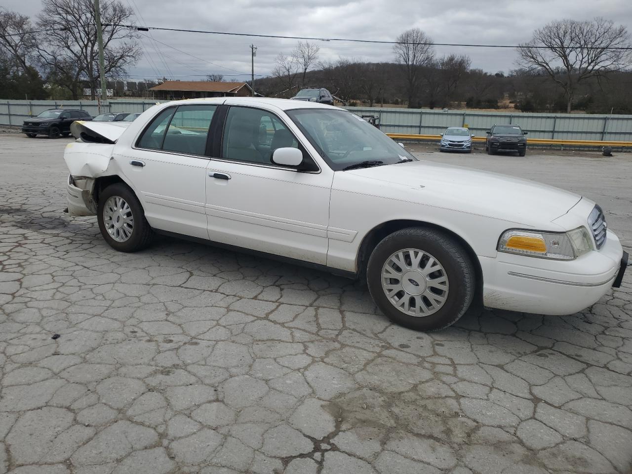 2003 Ford Crown Victoria VIN 2FAFP74W13X109348 Copart auction photo, rear end damage thumbnail 4