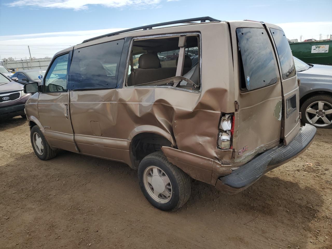 1999 GMC Safari VIN 1GKDM19WXXB512466 Copart auction photo, all over damage thumbnail 2