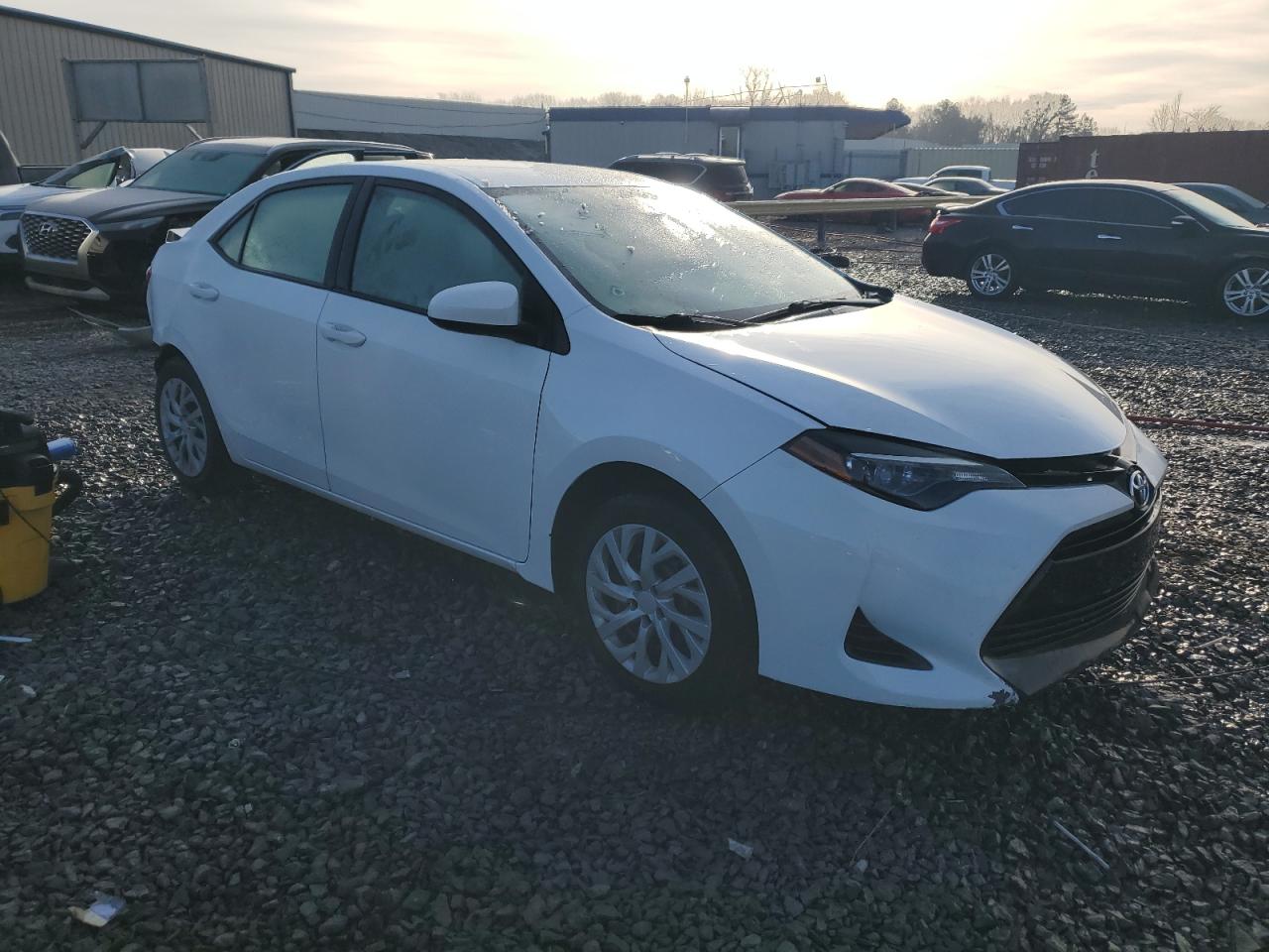 2017 Toyota Corolla VIN 5YFBURHE1HP702654 Copart auction photo, side / rear end damage thumbnail 4