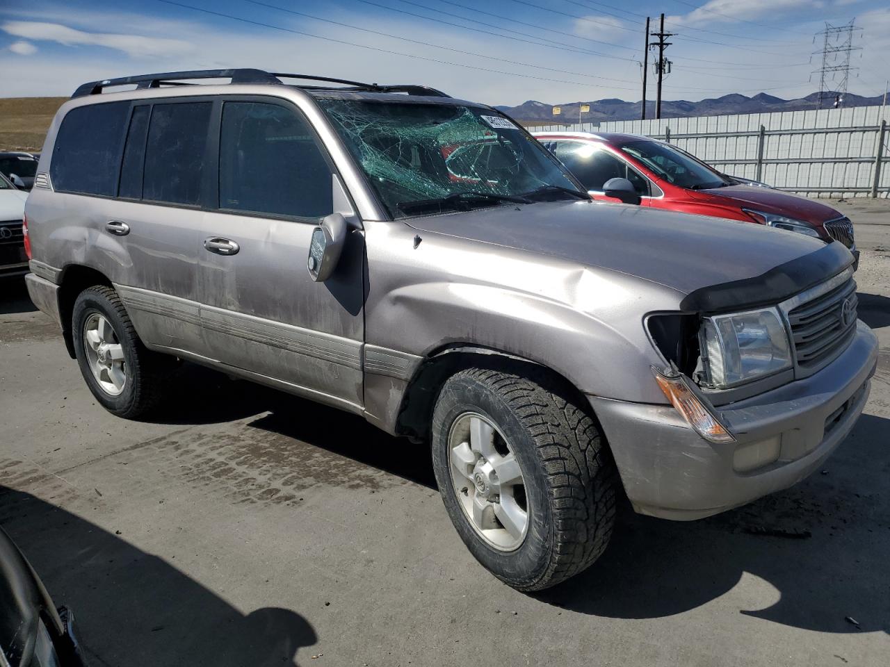 2005 Toyota Land Cruiser VIN JTEHT05J652078754 Copart auction photo, rollover damage thumbnail 4