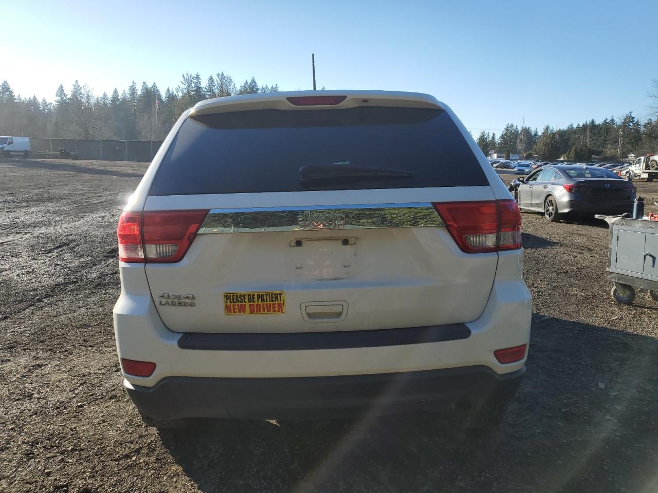 2012 Jeep Grand Cherokee VIN 1C4RJFAG9CC209209 Copart auction photo, all over damage thumbnail 6