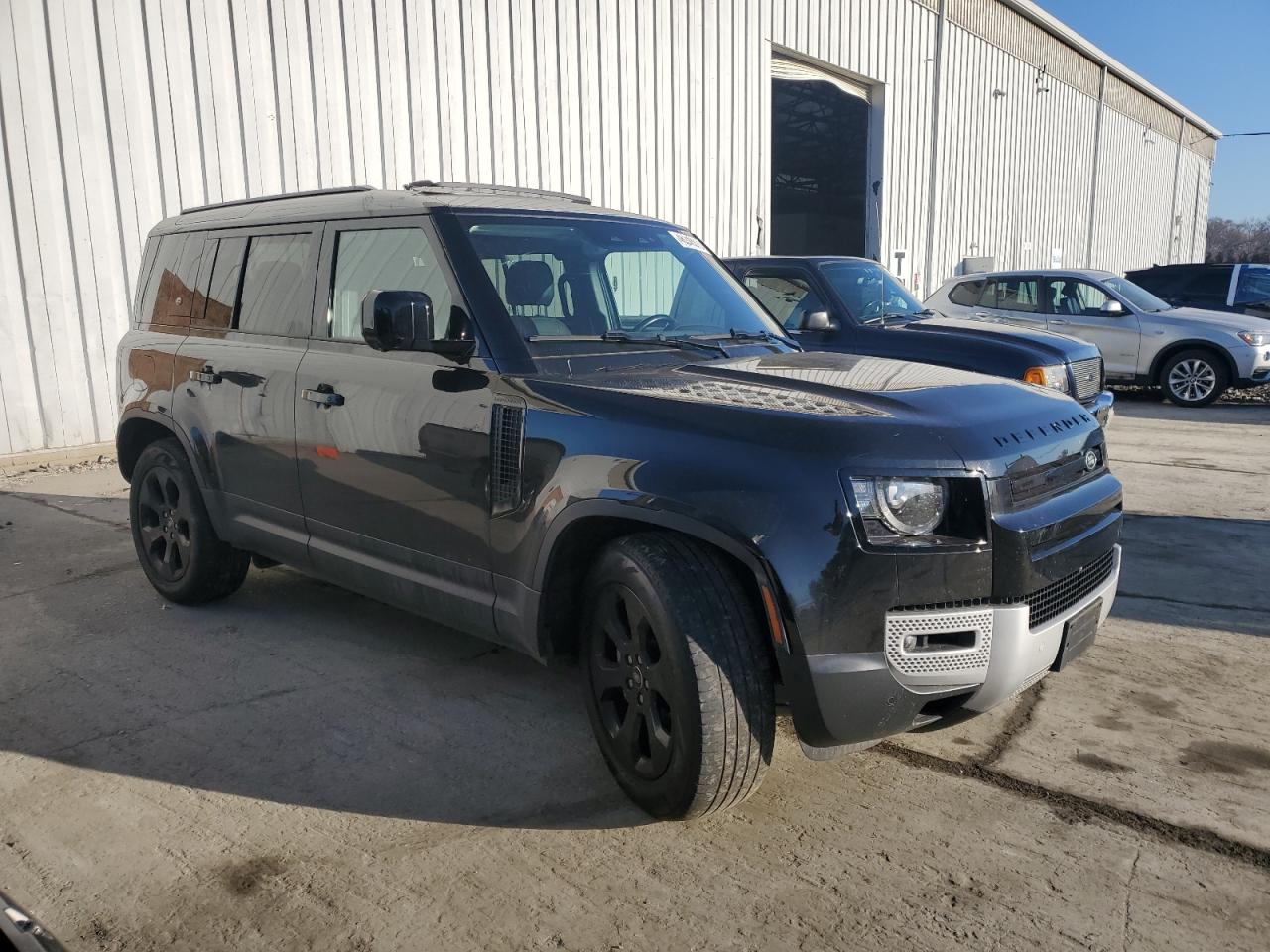 2023 Land Rover Defender VIN SALEPEEU7P2115633 Copart auction photo, top/roof damage thumbnail 4