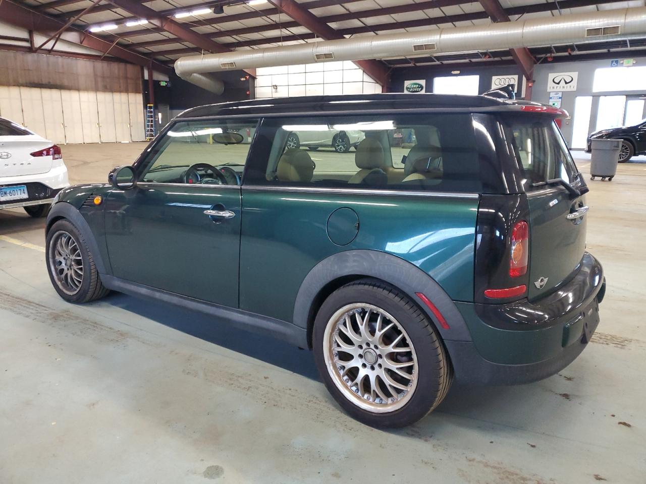2009 MINI Cooper VIN WMWML335X9TX36230 Copart auction photo, front end / minor dent/scratches damage thumbnail 2