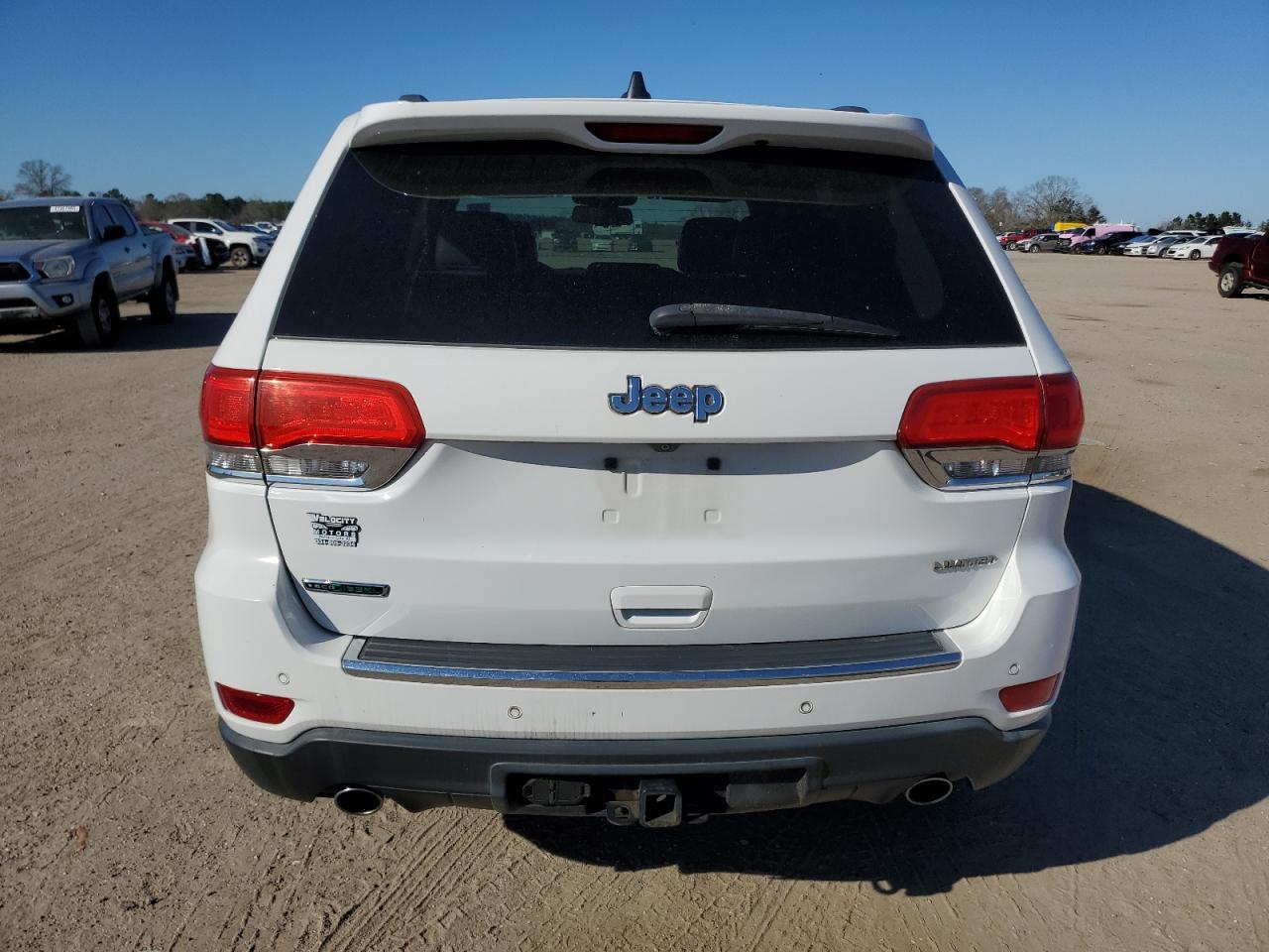 2014 Jeep Grand Cherokee VIN 1C4RJEBMXEC300250 Copart auction photo, minor dent/scratches damage thumbnail 6