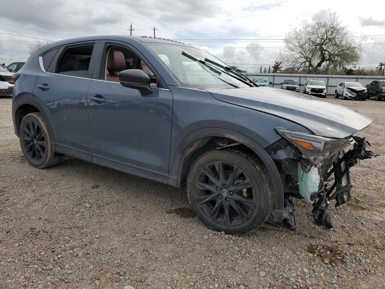 2021 Mazda CX-5 VIN JM3KFACM4M0473022 Copart auction photo, front end damage thumbnail 4