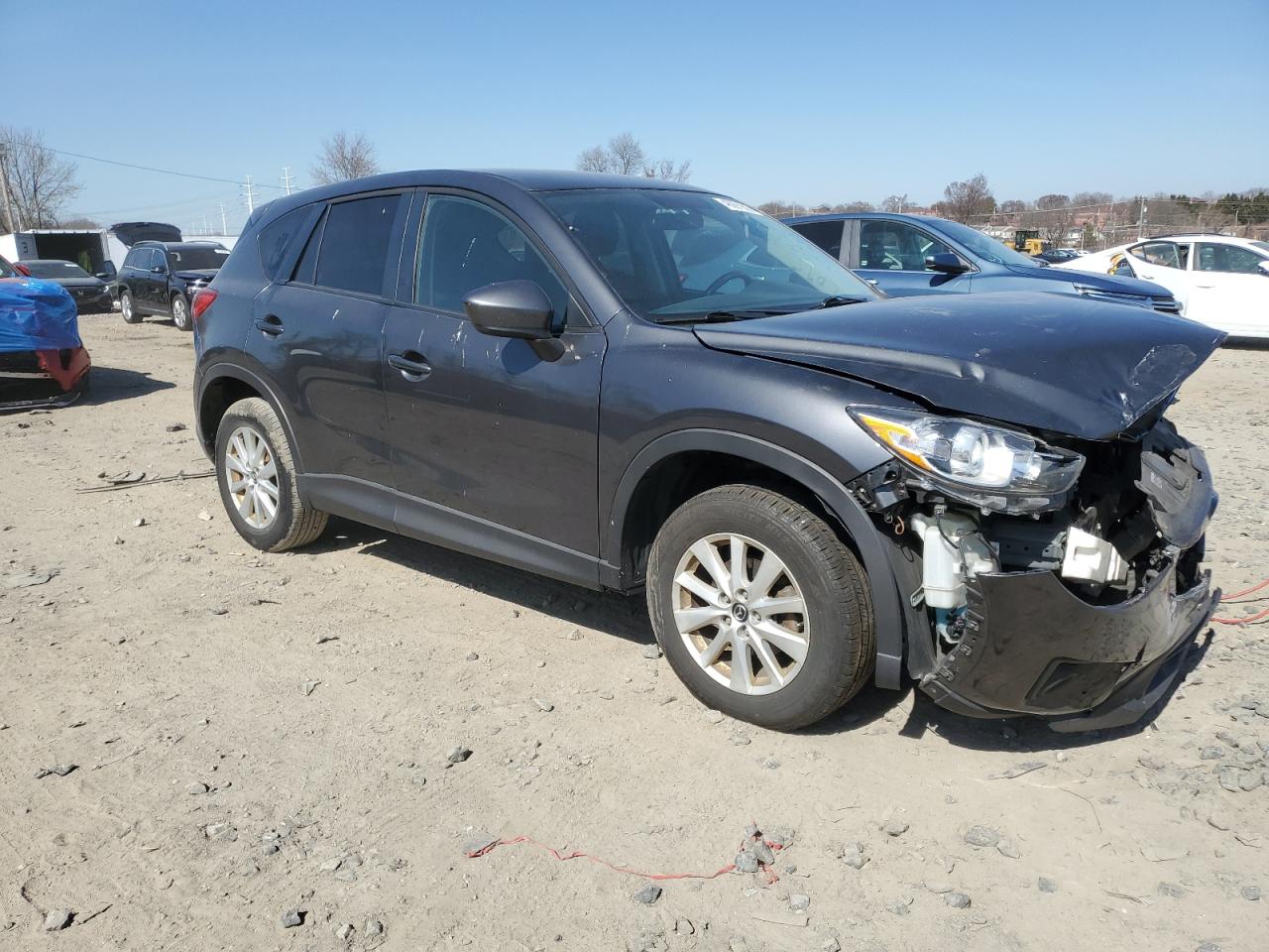 2014 Mazda CX-5 VIN JM3KE2CY0E0322059 Copart auction photo, front end / minor dent/scratches damage thumbnail 4