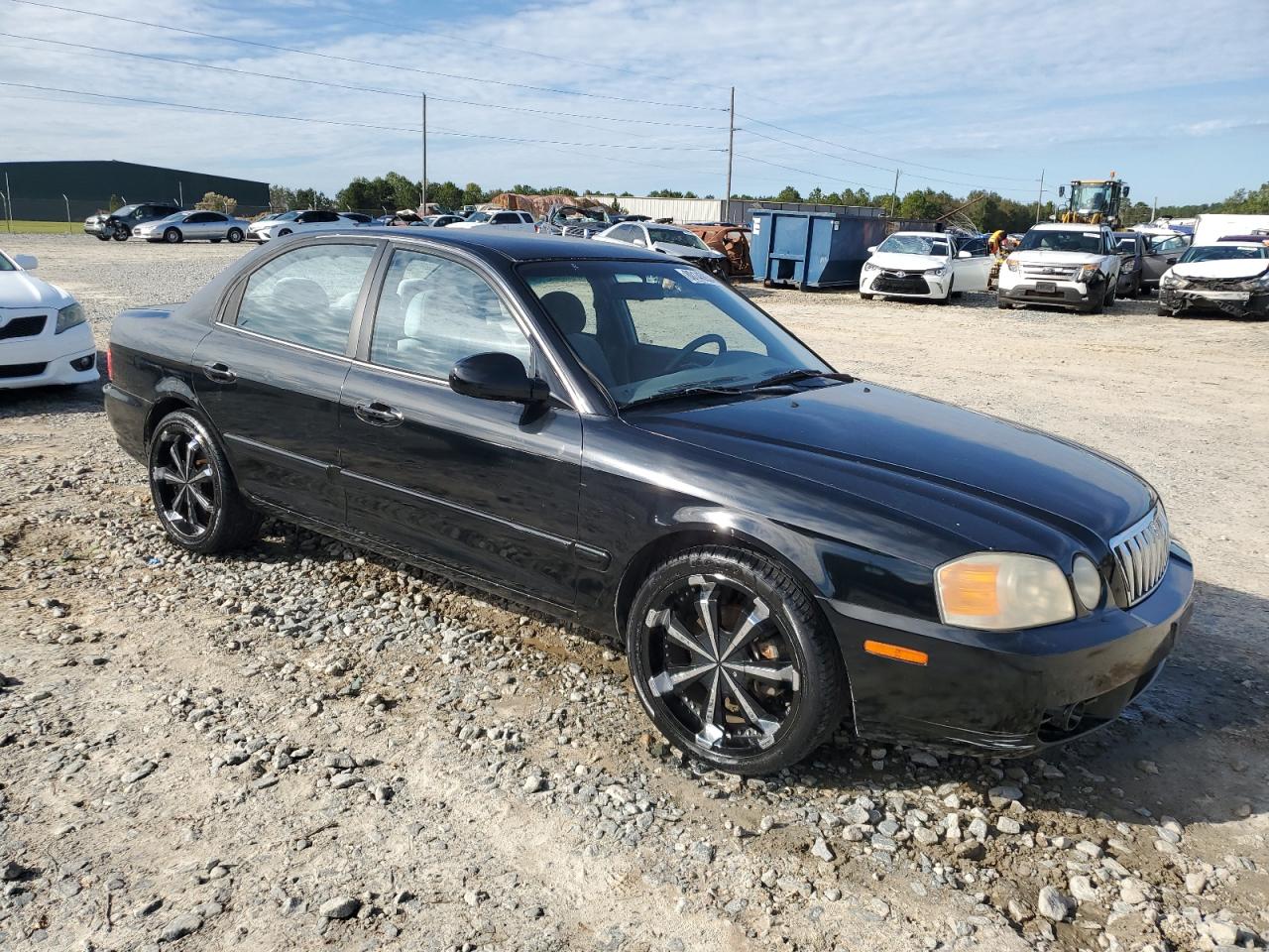 2003 KIA Optima VIN KNAGD126X35224701 Copart auction photo, side damage thumbnail 4
