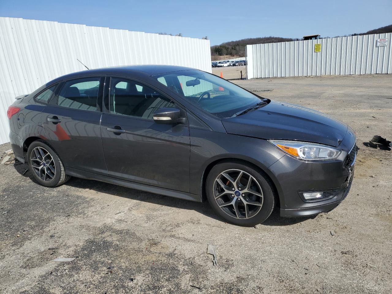2016 Ford Focus VIN 1FADP3F23GL201882 Copart auction photo, side damage thumbnail 4